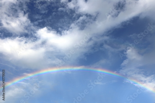 blue sky with rainbow