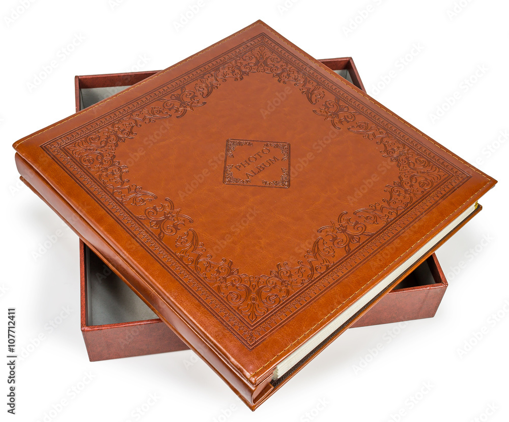 Fototapeta premium Brown leather photo album cover with decorative frame 