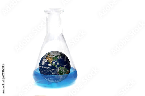 The earth in blue chemical, test tube ,including elements furnis photo