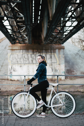 Beautiful girl on a bicycle urban