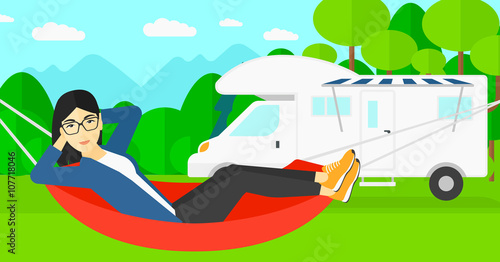 Woman lying in hammock.