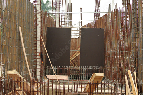 Hot rolled deformed steel bars or steel reinforcement bar. The reinforcement bar is part of building strcture function to strengten the concrete. 
 photo