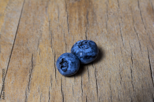 Blueberries On A Blue Wooden Background