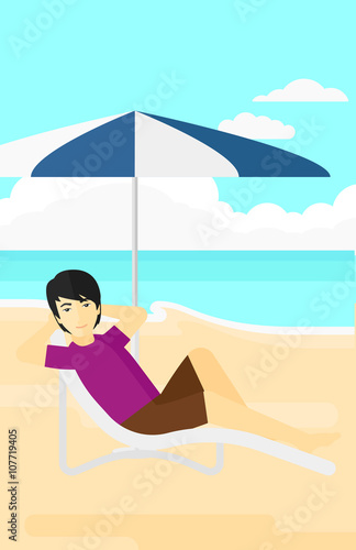 Man sitting in chaise longue.