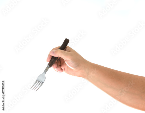 hand holding a silver fork  isolated on white