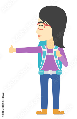 Young woman hitchhiking.