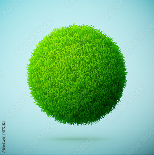 Green grass sphere on a blue clear background