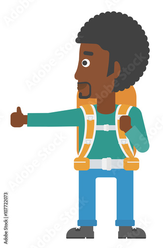 Young man hitchhiking.