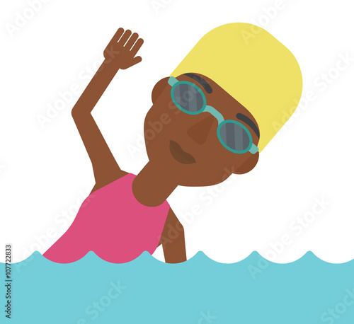 Swimmer training in pool.