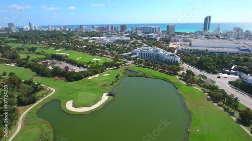 Aerial video of a drone flying up and away from Miami Beach photo