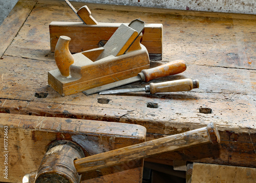 planes and chisels in the Workbench with a wooden vise inside th