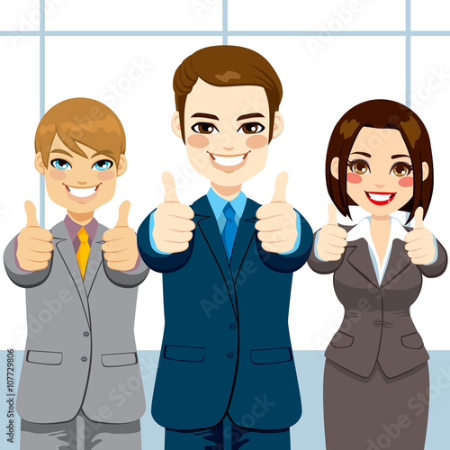 Three business people making thumbs up hand sign on an office smiling happy