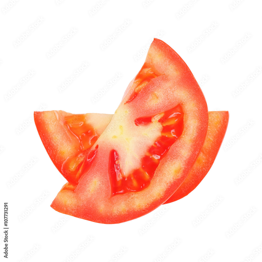 Half sliced tomato isolated on white Half sliced tomato isolated on white