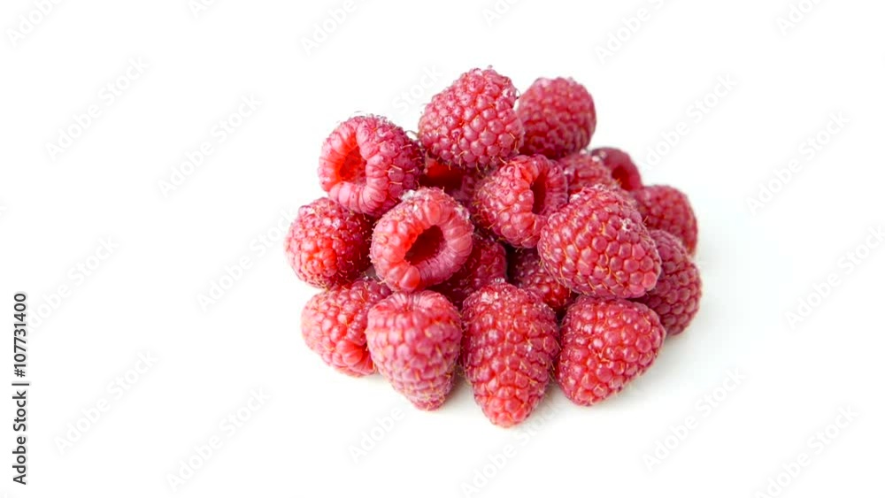 Pile of Raspberries Rotating on White Background Pile of Raspberries Rotating on White Background