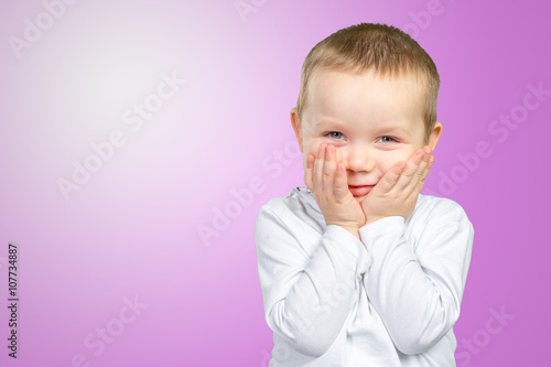 Child expressing surprise and happiness