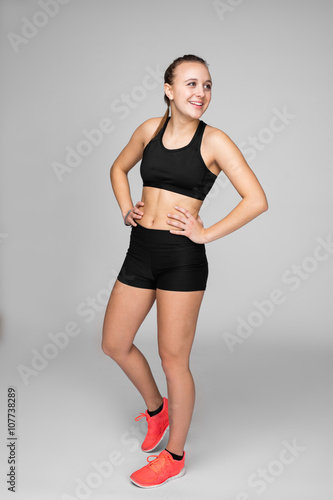 Young caucasian track and field athlete portraits at studio