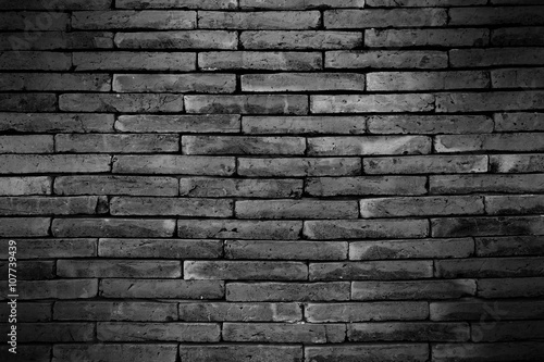 Dark brick wall with shadow for pattern and background