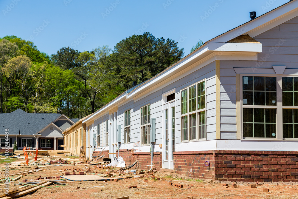 Siding and Windows on New Row House Construction Siding and Windows on New Row House Construction