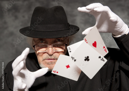 Magician show with playing cards