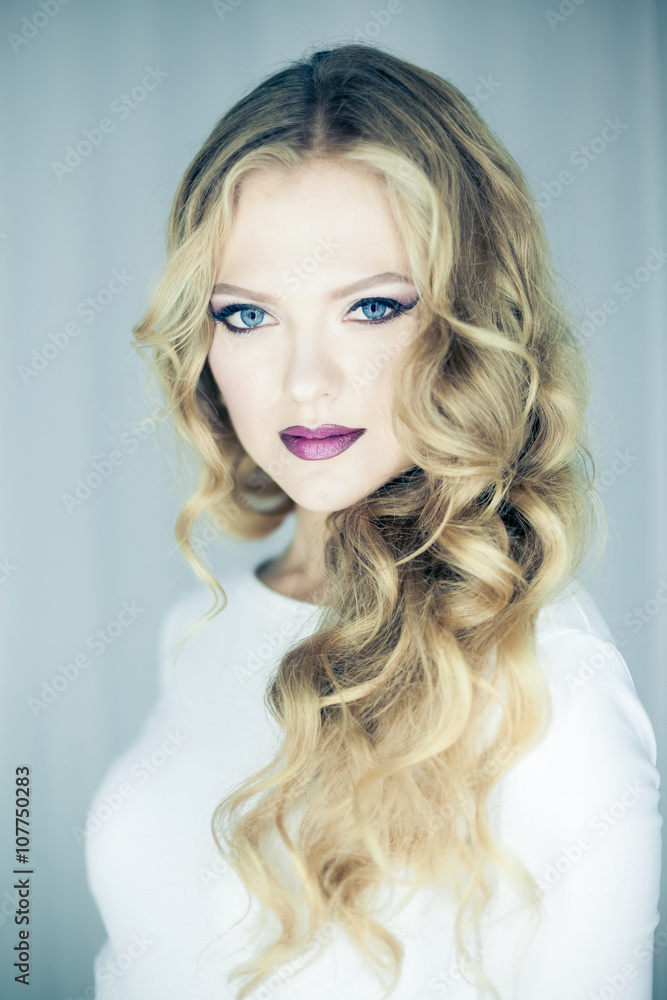 Portrait of beautiful young blond woman with clean face .Close up beauty portrait of young model with clean fresh skin and professional makeup. Portrait of beautiful young blond woman with clean face .Close up beauty portrait of young model with clean fresh skin and professional makeup.