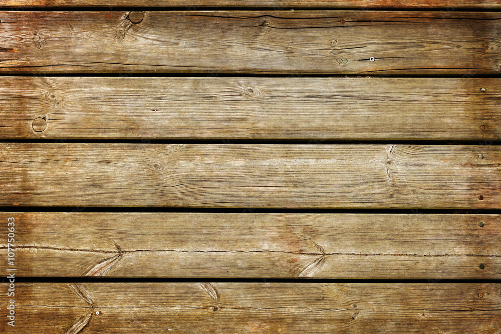 Part of old wooden pier made from planks. Part of old wooden pier made from planks.