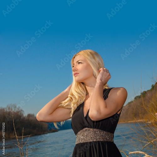 portrait of a beautiful girl outdoors in spring