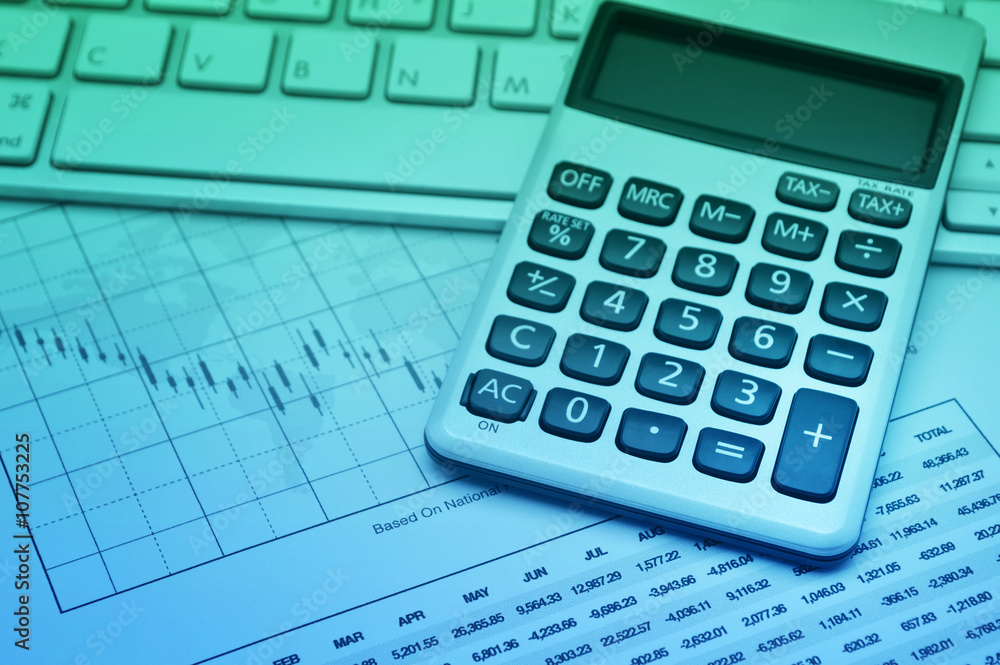 Calculator button plus on keyboard and graph paper, accounting b Calculator button plus on keyboard and graph paper, accounting b