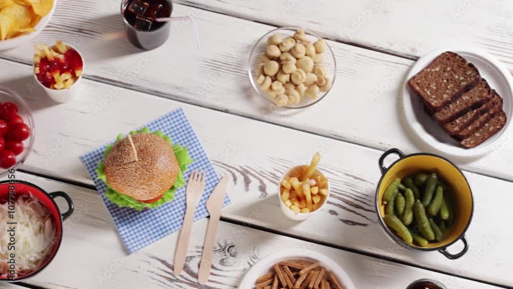 Burgers and brown grain bread. Mushrooms and bread on table. Tasty food on white table. Junk food or fresh bread. Burgers and brown grain bread. Mushrooms and bread on table. Tasty food on white table. Junk food or fresh bread.