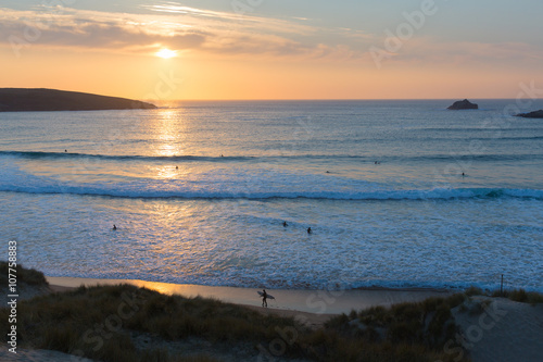 Photography Sunset Cornwall surfers surfing Crantock bay near Newquay uk
