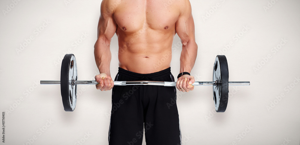 Strong man with barbell. Strong man with barbell.