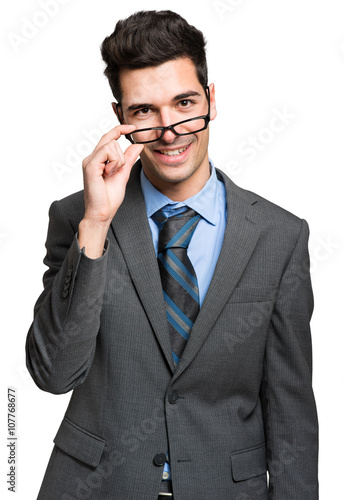 Smiling businessman portrait on white background