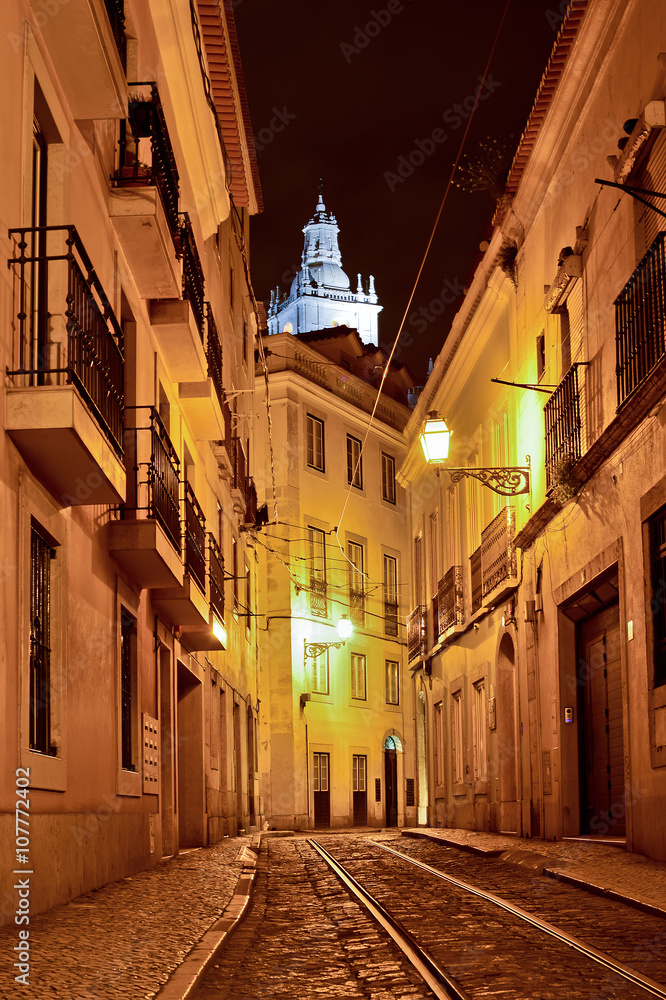 Alfama quarter at night in Lisbon, Portugal