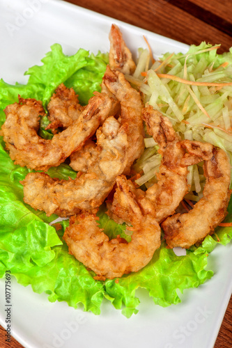Fried shrimps at plate