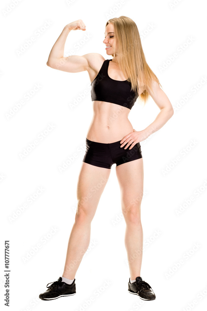 Young muscular woman posing