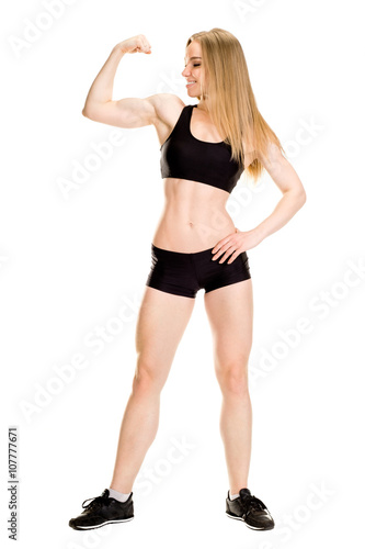 Young muscular woman posing