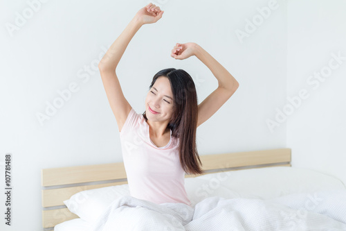 Woman wake up at morning