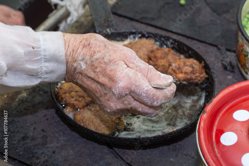 Grandmothers hand cooking and preparing food