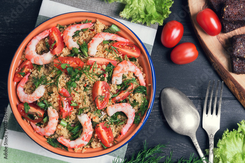 Blue ceramic bowl with couscous