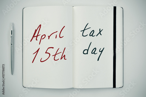 text april 15th tax day in a notepad