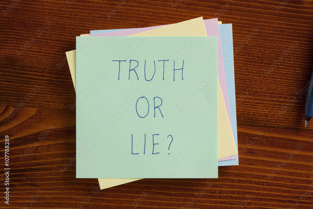Truth or lie written on a note Truth or lie written on a note