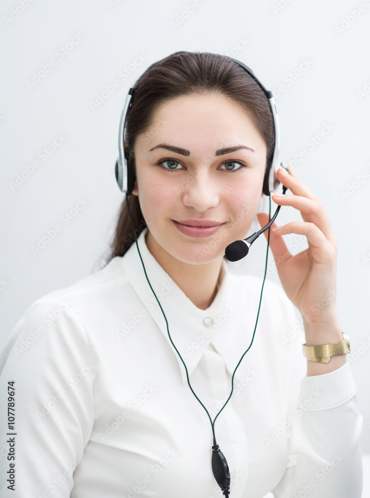 smiling business woman with headphones looking ahead smiling business woman with headphones looking ahead