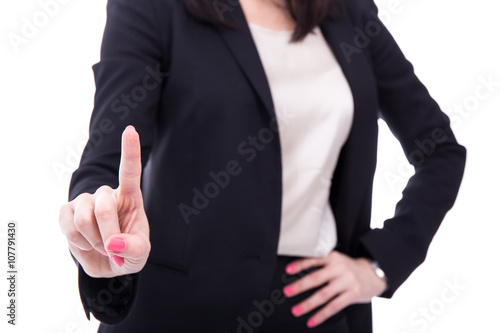 business woman touching imaginary screen or pressing button with