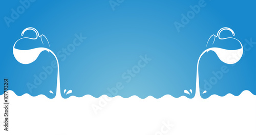 Milk flows from jug. Spray drops and white wave on blue background