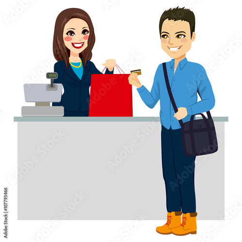 Young man paying purchase with credit card while female store clerk is giving shopping bag