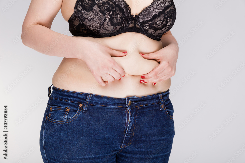 Naklejka premium Womans fat belly
