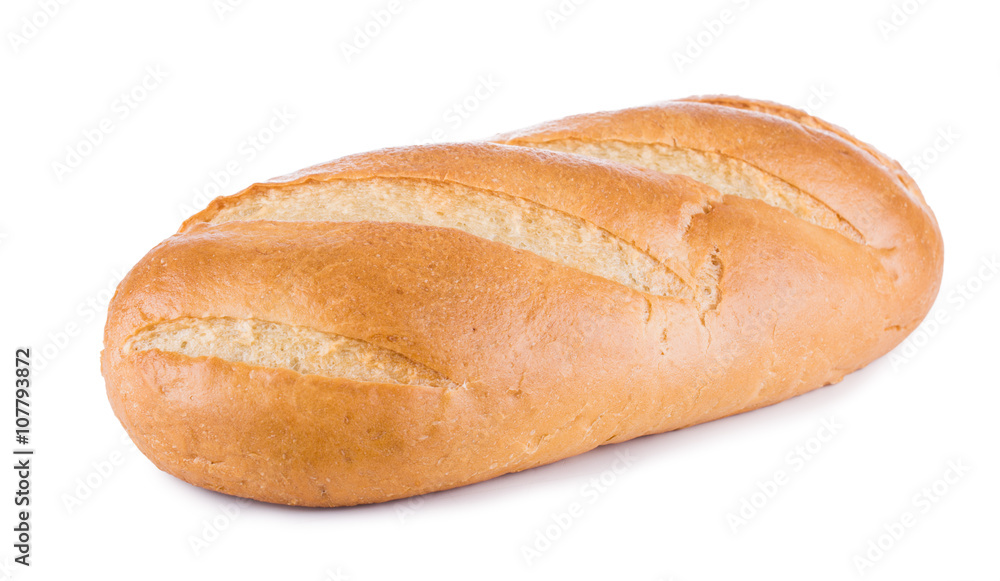 White wheaten long loaf on a white background. Bread close-up. White wheaten long loaf on a white background. Bread close-up.