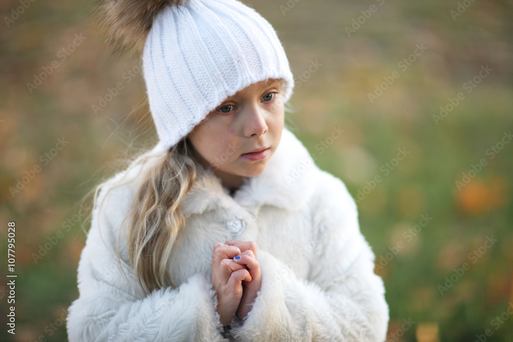 Closeup portrait of a beautiful little girl outdoors Closeup portrait of a beautiful little girl outdoors
