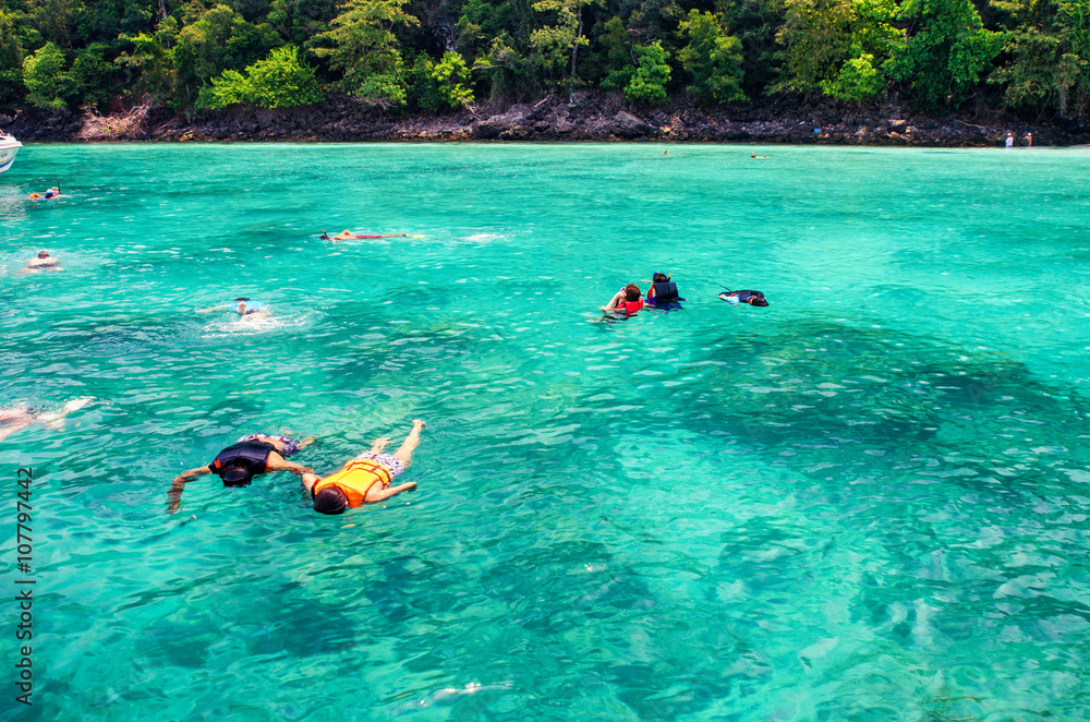 Fototapeta premium Travelers are swimming and snorkeling in Andaman sea at Similan