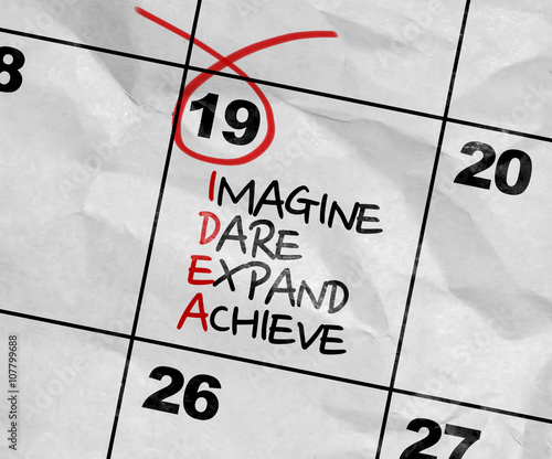 Concept image of a Calendar with the text: IDEA - Imagine, Dare, Expand, Achieve