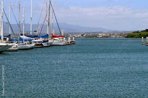 Rainbow, Bay Marina / Located near Pearl Harbor in Oahu, Hawaii. In the background, is the Waianae Mountain range.